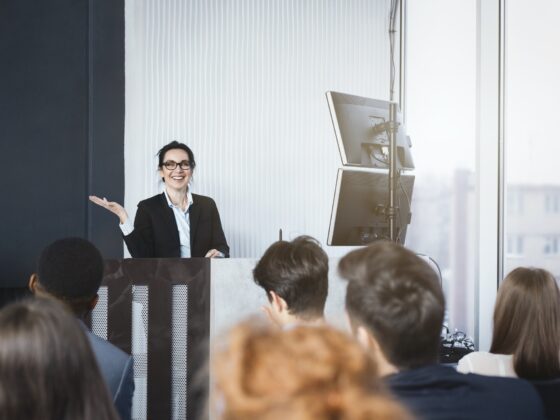 Business woman giving presentation at conference room